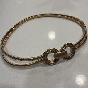 Zara gold infinity elastic metal stretch belt. 32 inches in length.